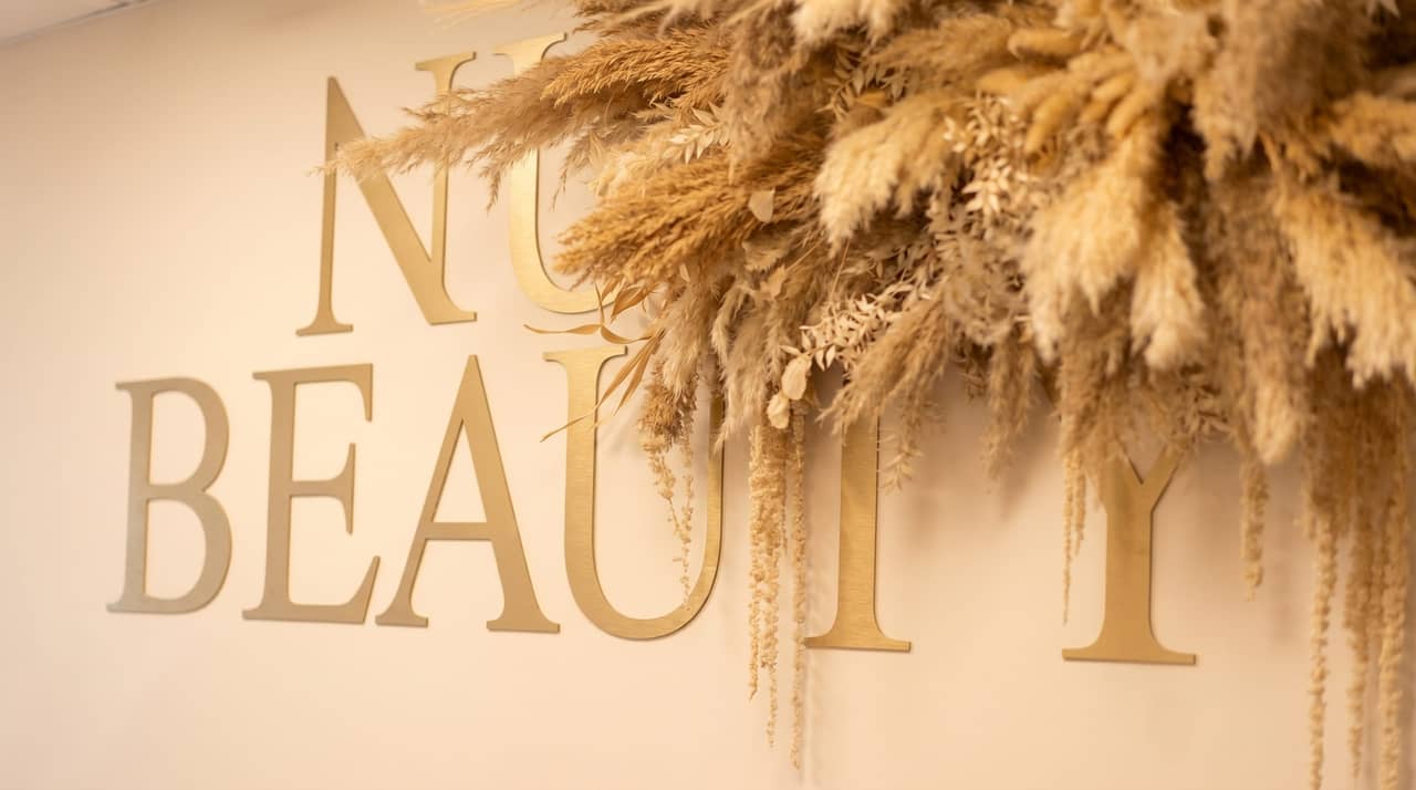 A calm, light-filled treatment room at Nu Beauty