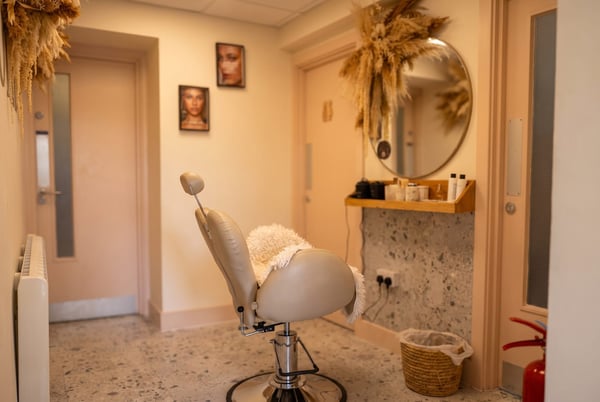 A warm, editorial view of the brow and lash station at NU Beauty in Haverhill, freshly set up and ready for a brow tidy or lash tint before a big night out
